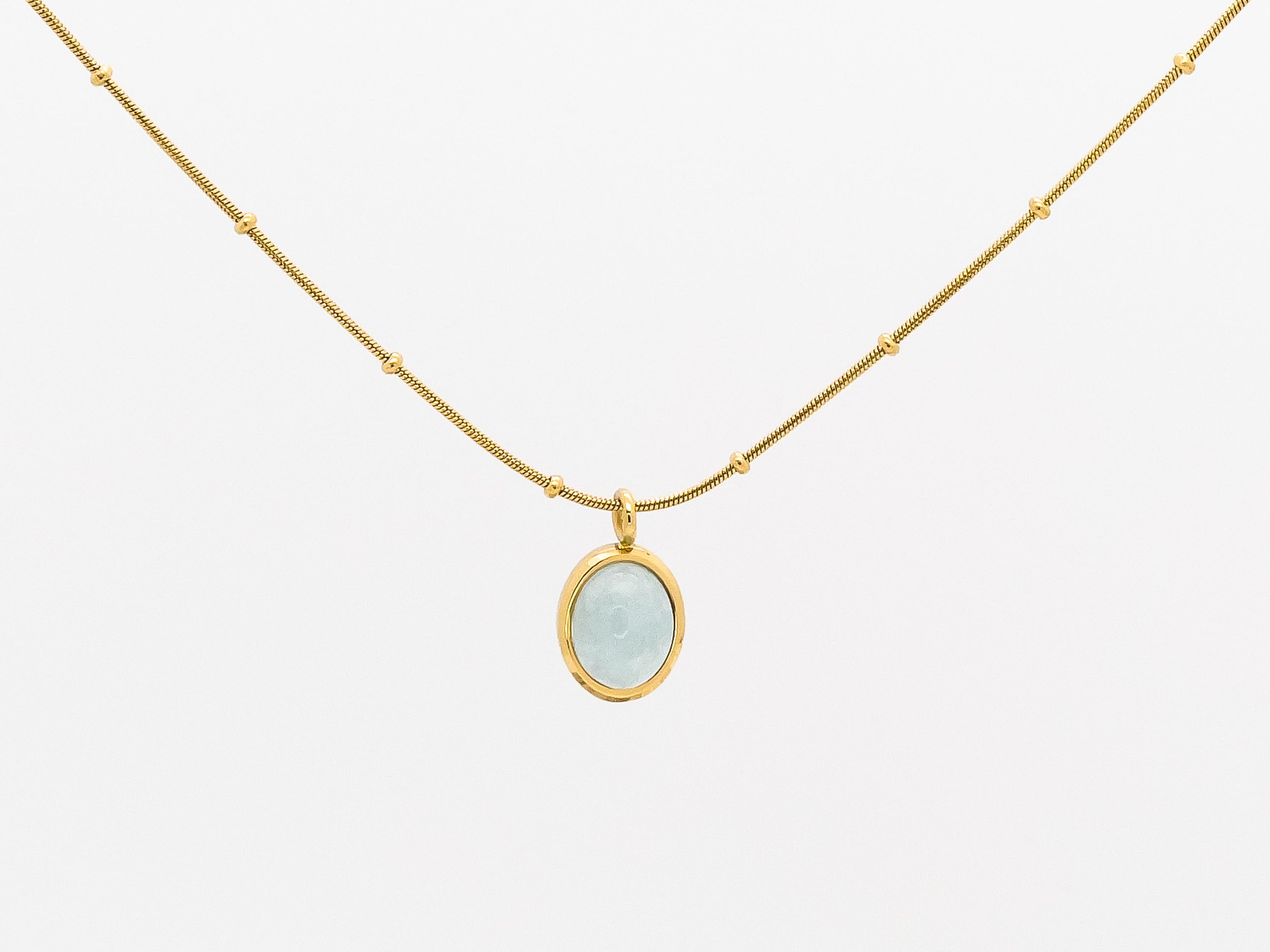 Aqua blue gemstone pendant necklace with gold chain