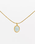 Aqua blue gemstone pendant necklace with gold chain