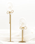 Sweetie Bow Tie Statement Drop Earrings in Gold - Fashion Jewelry  | Chic Chic Bon