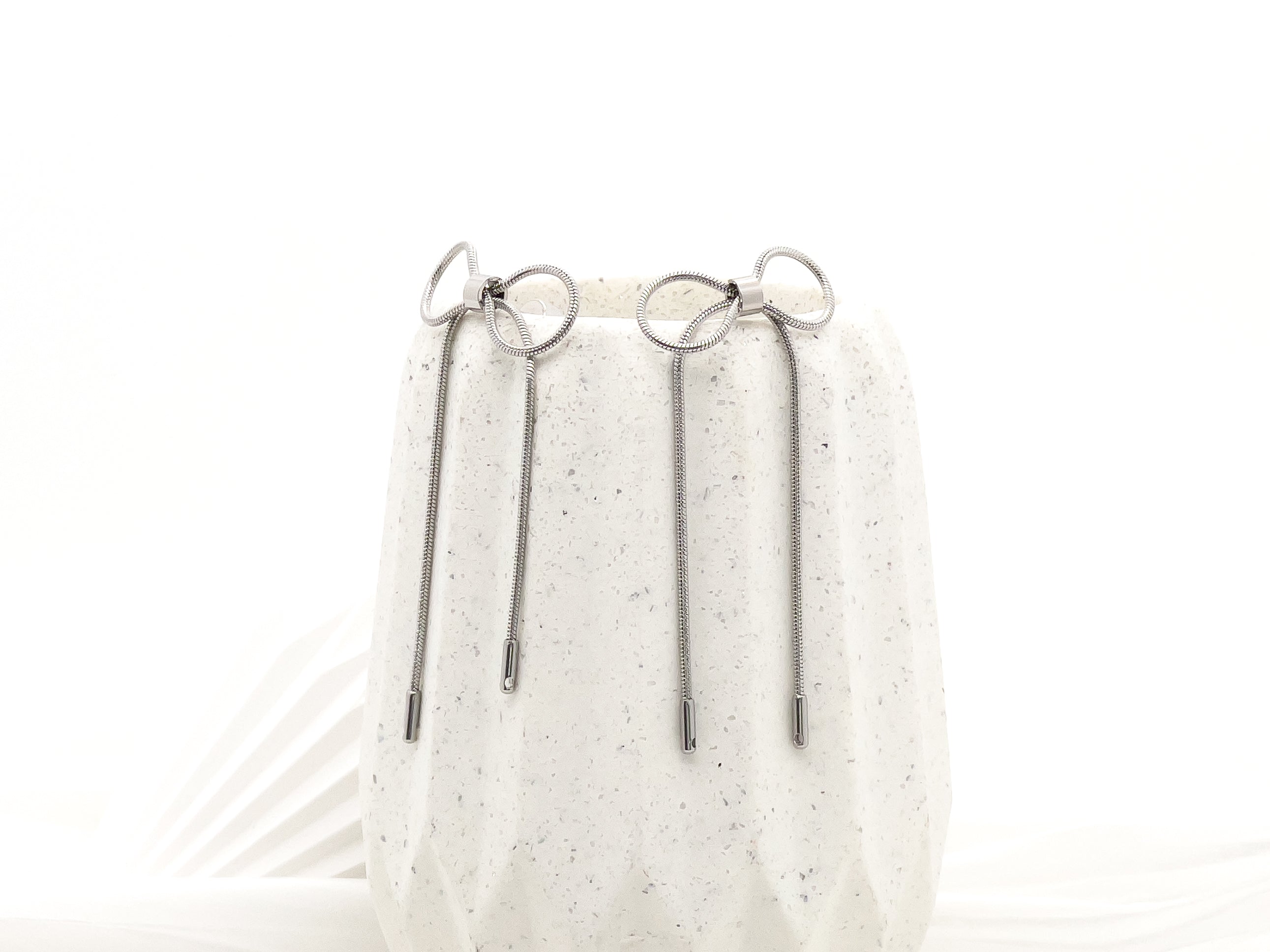 Sweetie Bow Tie Statement Drop Earrings in Silver - Fashion Jewelry  | Chic Chic Bon